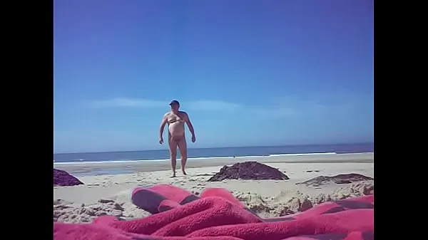 Frisk jean marc Moindre is on a public beach in 2016 02 mit rør
