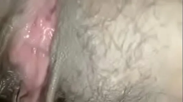 Fresh Cum fills her clit, spreading her pussy. The call girl rubs her clit with his cock before stuffing his cock into her clit until she cums a lot, the cock is extremely excited my Tube